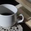 读者「夜航西飞」的头像，夜色窗台上一杯冒热气的茶与笔记本屏幕微光